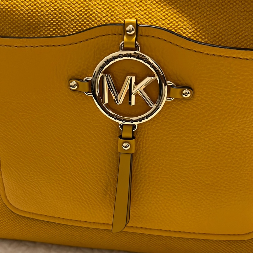 Mustard yellow. New never used. Authentic Michael kors